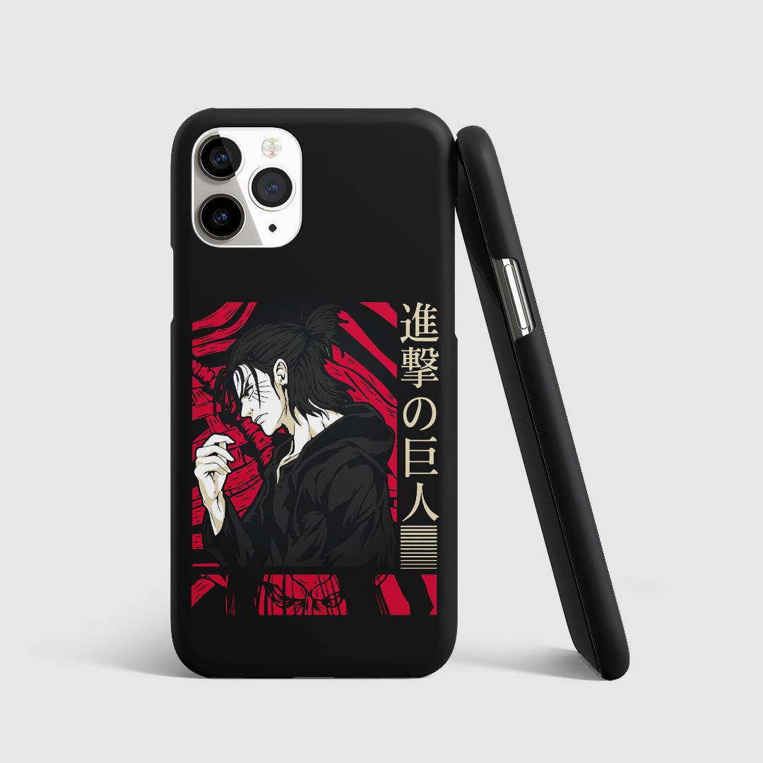Bold artwork of Eren Yeager from "Attack on Titan" in red and black on phone cover.