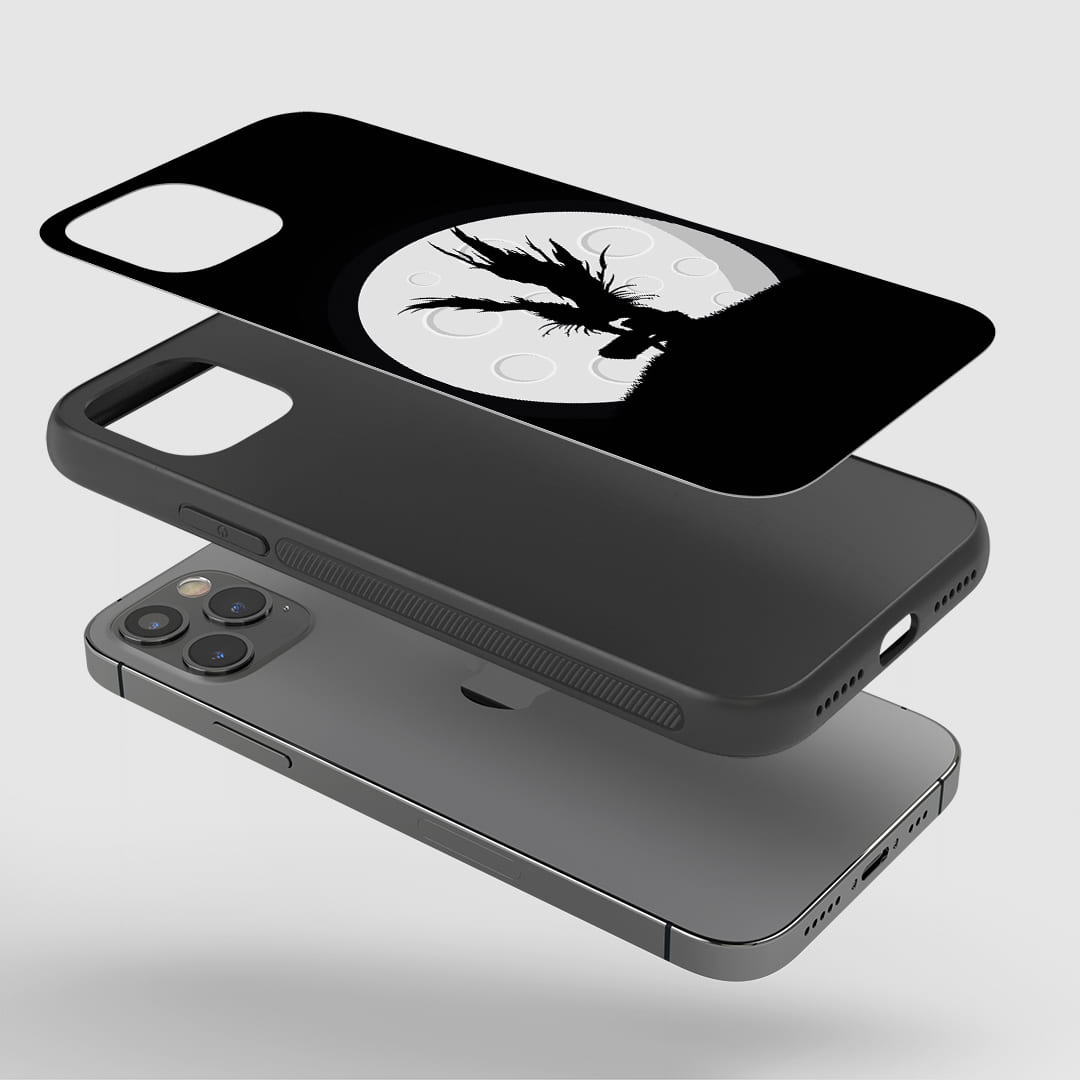 Ryuk Black & White Phone Case installed on a smartphone, offering robust protection and a striking design.
