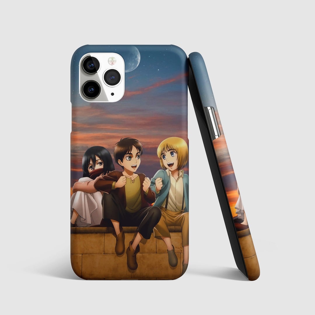 Striking artwork of Eren, Mikasa, and Armin from "Attack on Titan" on phone cover.