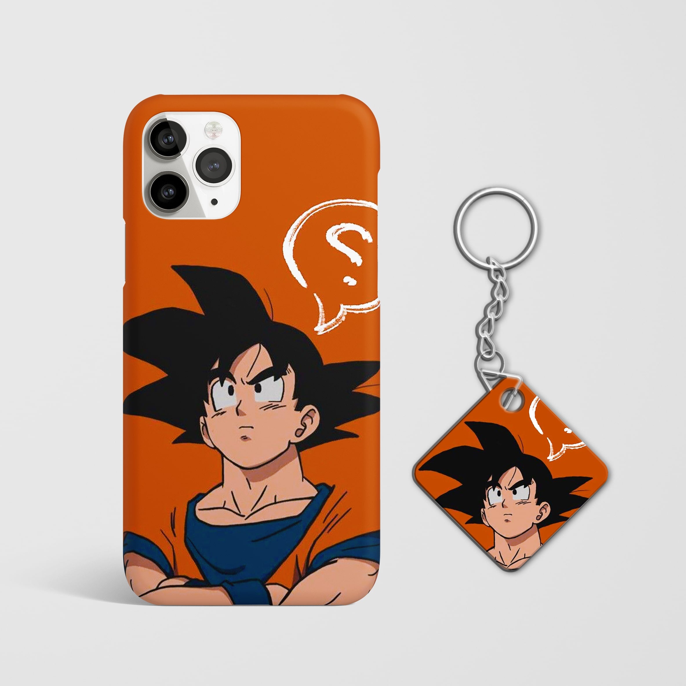 Close-up of Goku's dynamic pose in orange on phone case with Keychain.