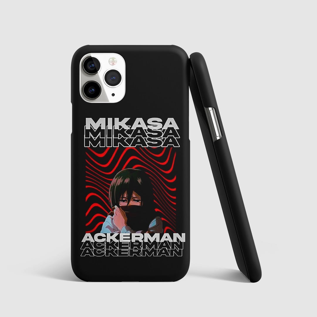 Striking artwork of Mikasa Ackerman from "Attack on Titan" on phone cover.