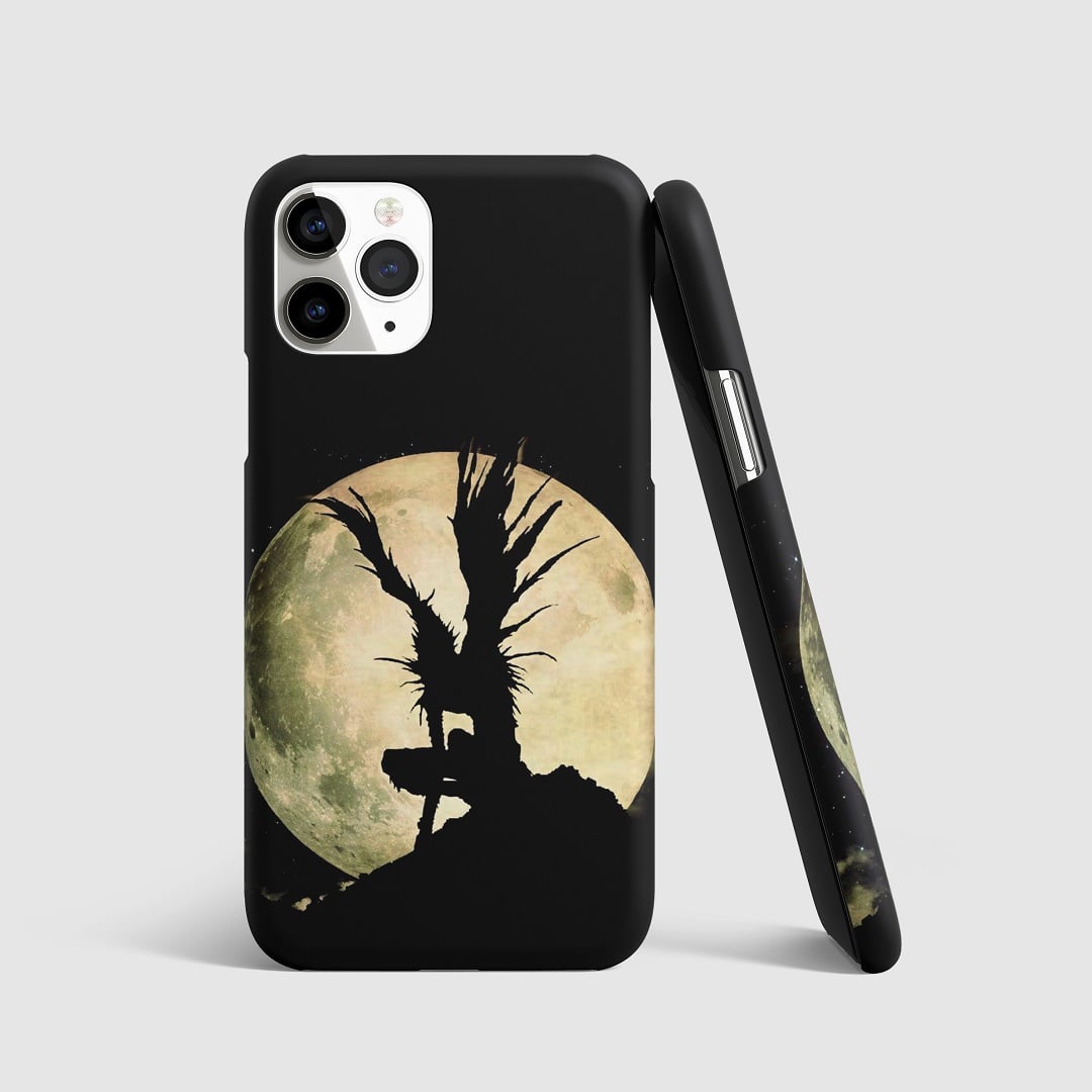 Striking artwork of Ryuk against a moonlit background from "Death Note" on phone cover.